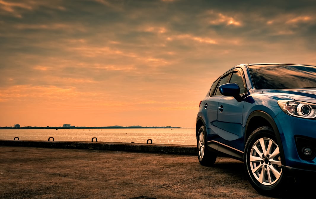 Blue Compact SUV at the Beach  